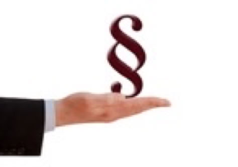 Paragrafenzeichen auf Hand